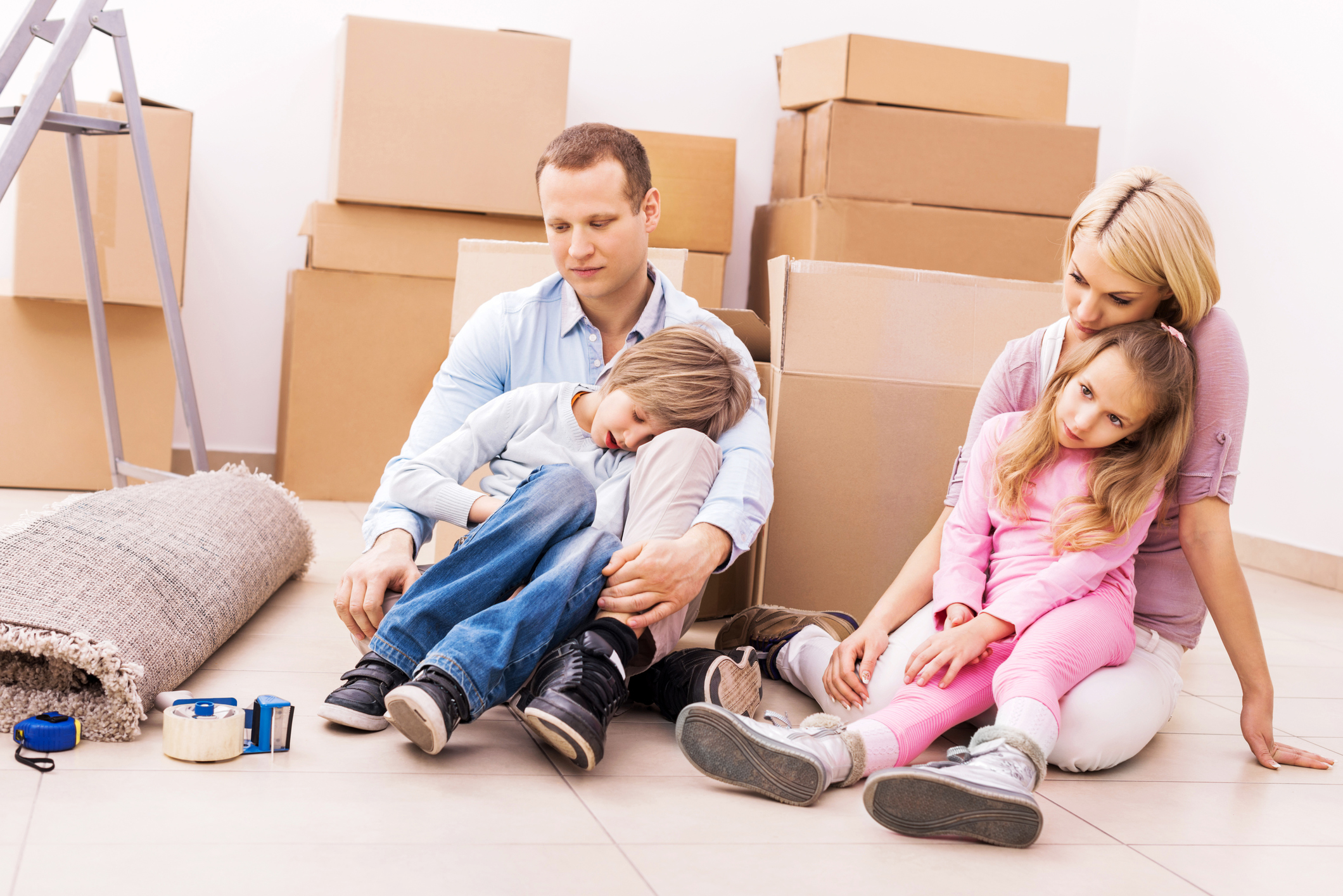 Exhausted family after packing