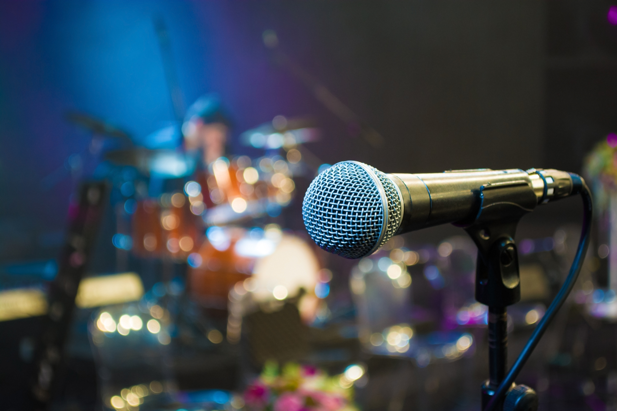 Microphone on the background of the drum set close up
