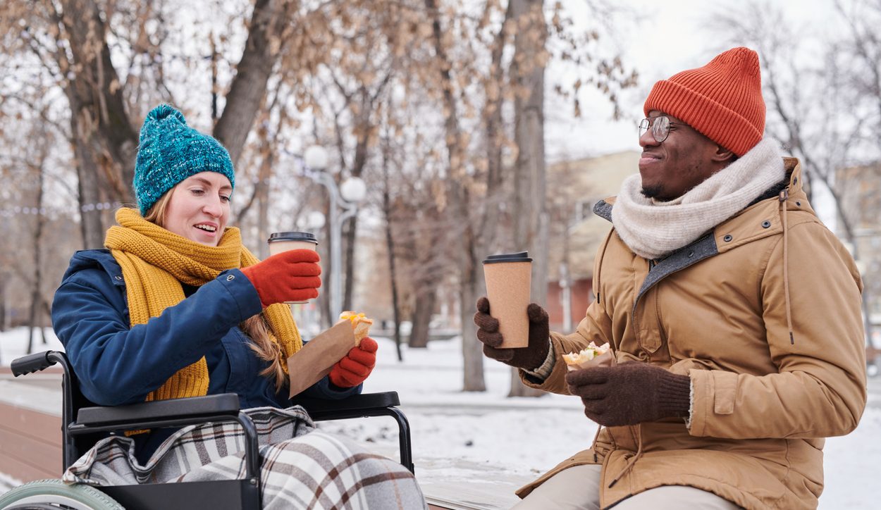 Couple drinking tea outdoors