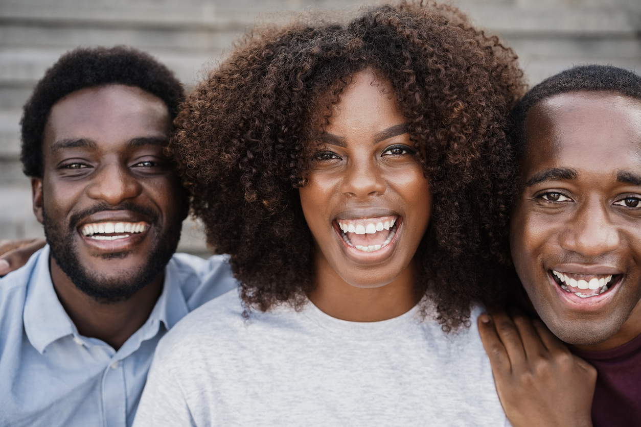 Young black people having fun looking at camera