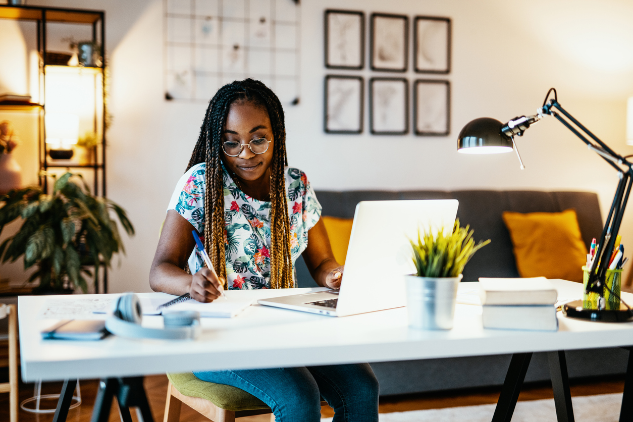 African American graduate student studying from home during covid-19 pandemic