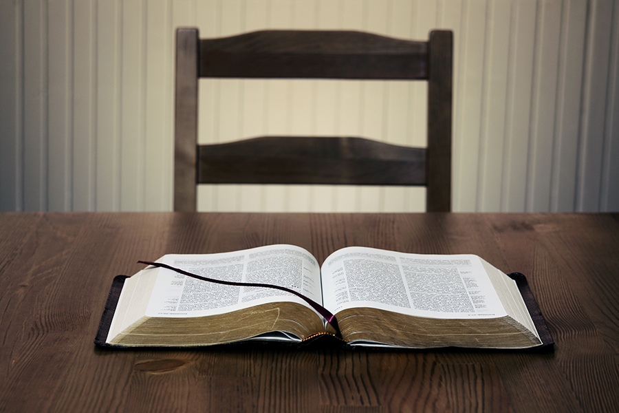 An open book lying on the table