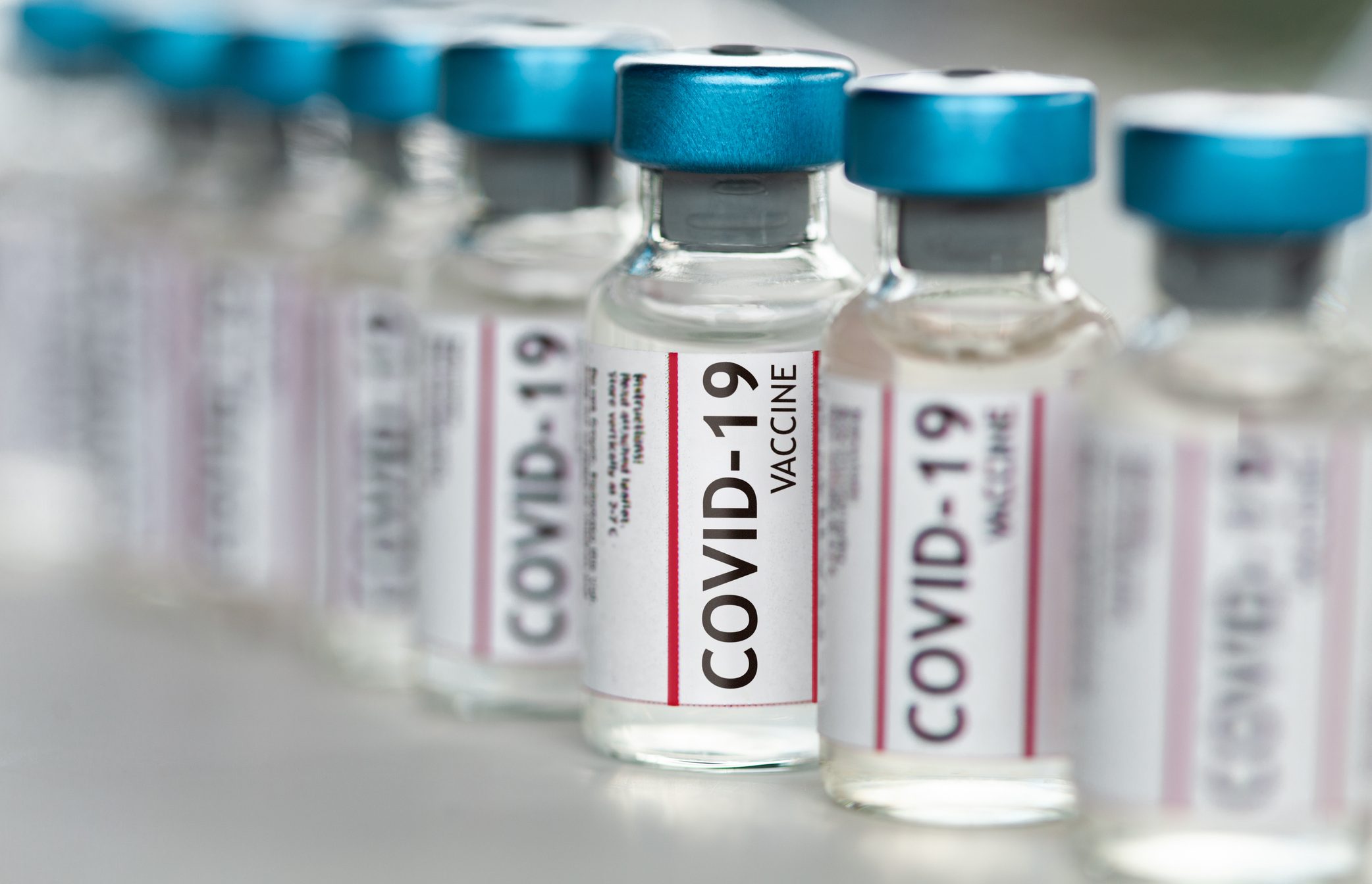 Covid-19 Coronavirus Vaccine vials in a row macro close up