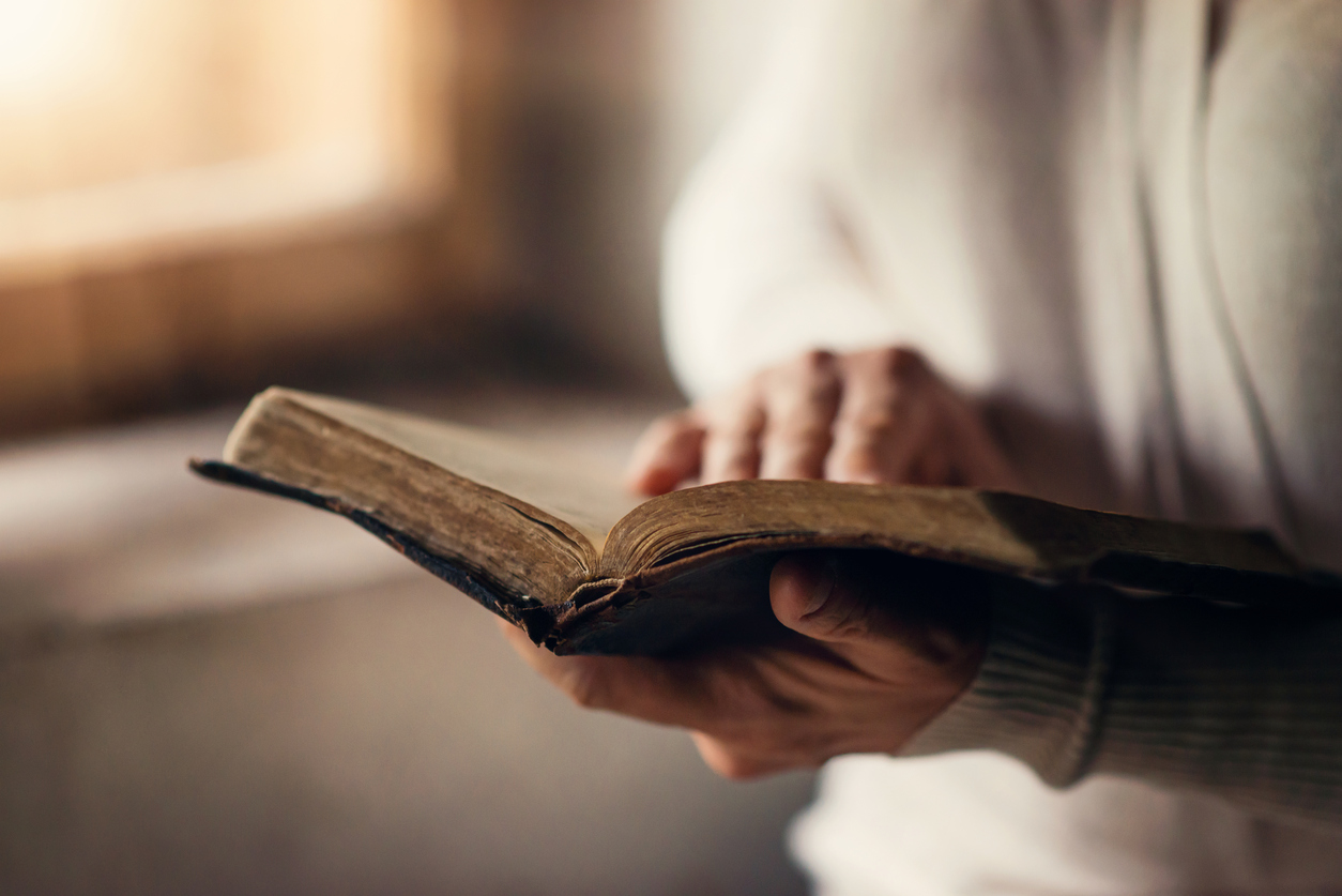 Woman holding a Bible