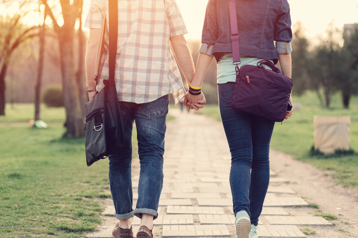 Couple holding hands