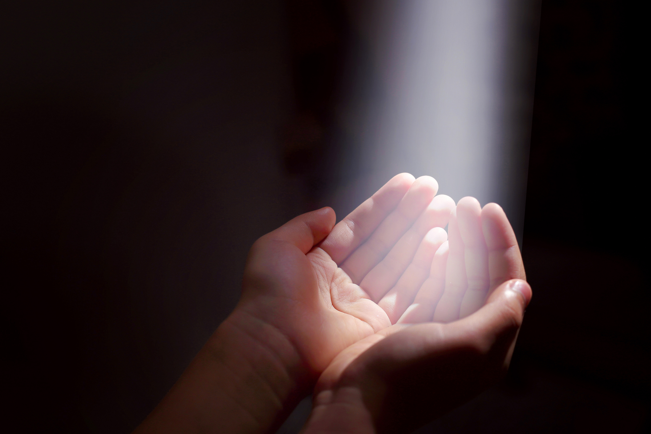 Light beam and hands