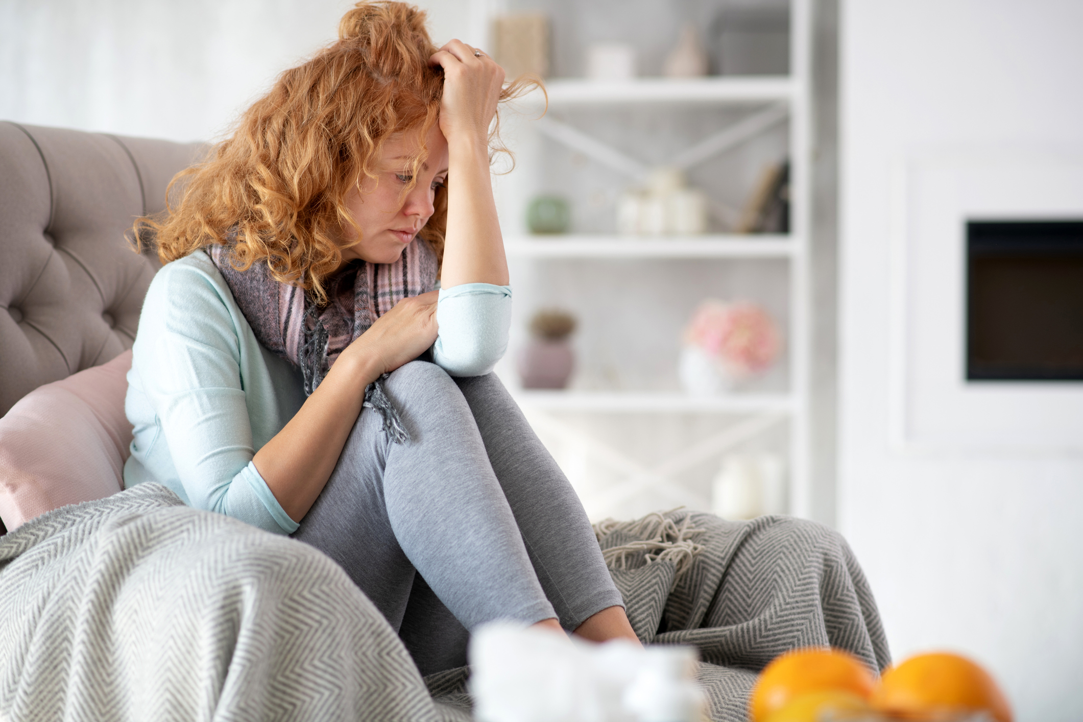 Red-haired woman having sick leave because of flu