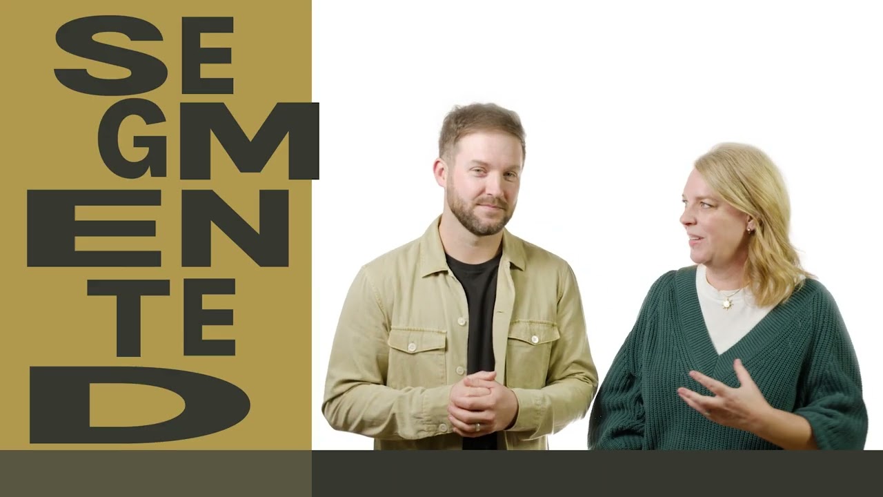 Two young people next to the 'Segmented' sign