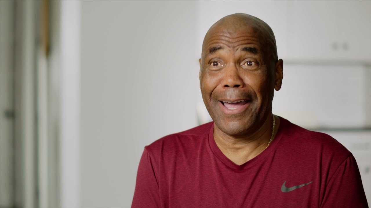 Smiling man in a red T-shirt