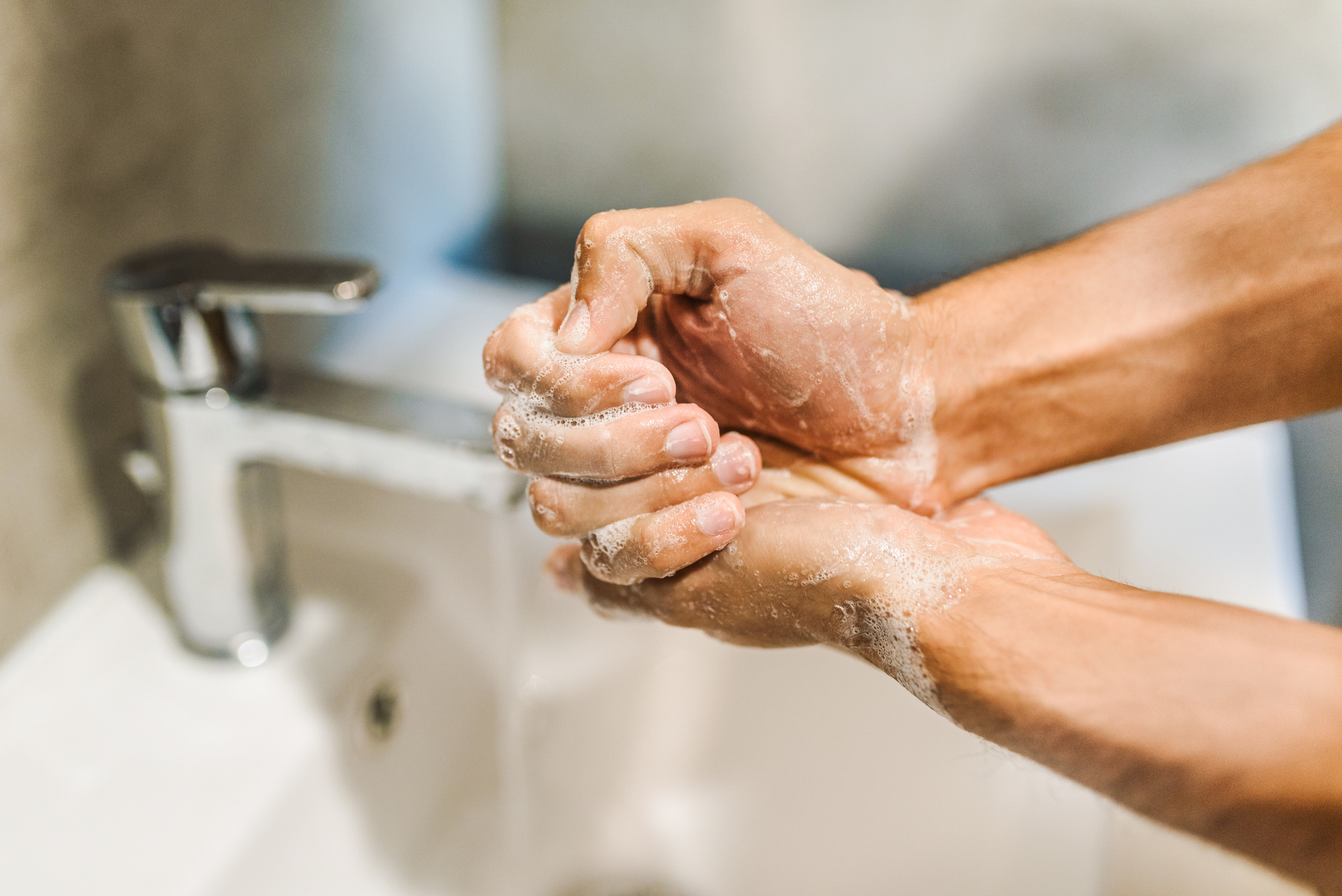 Man washing his hands