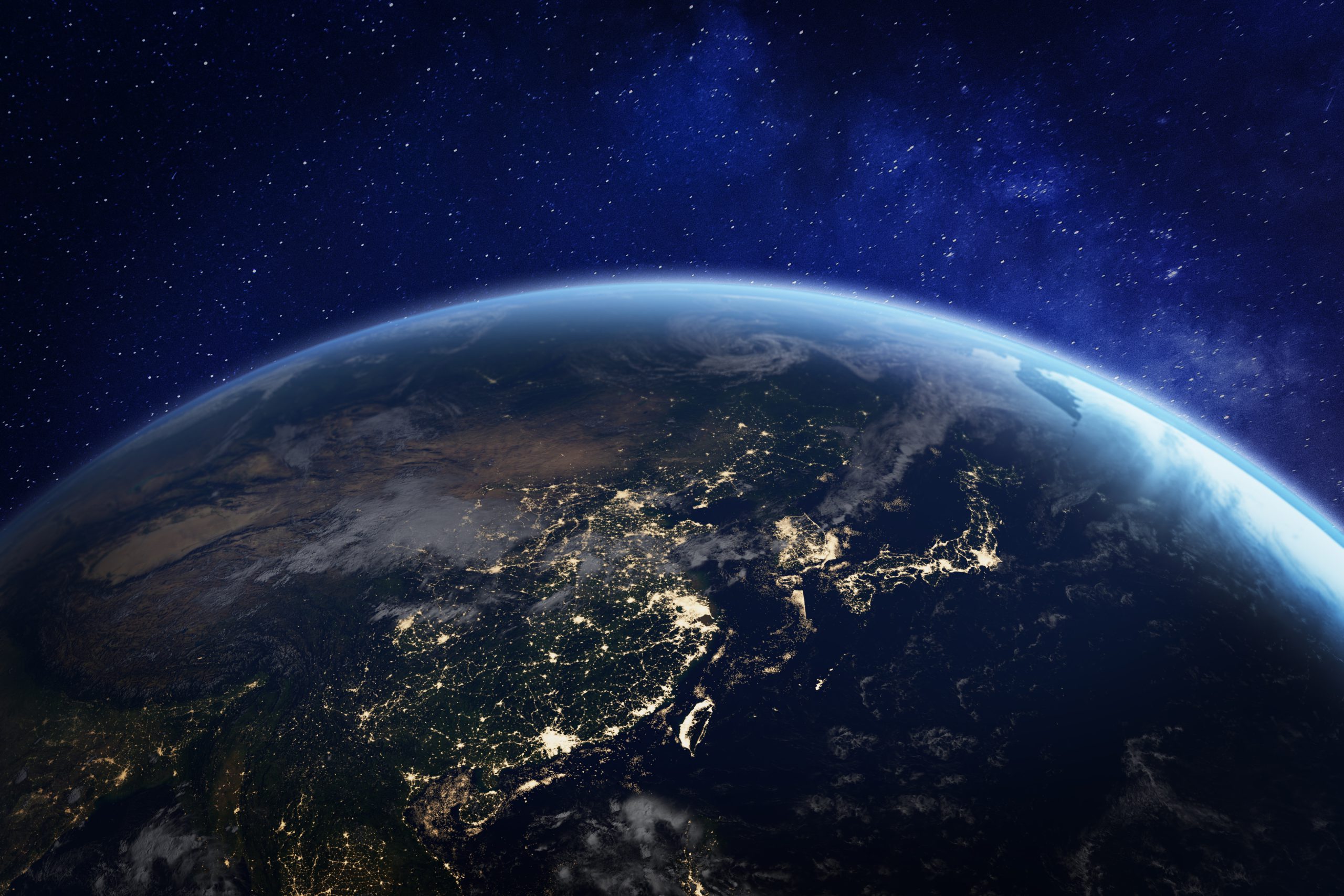 Asia at night from space with city lights showing human activity